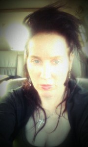 This was me, a couple of weeks after he died. I'd cut a bunch of my hair off. A short time later, I cut off the rest of it.